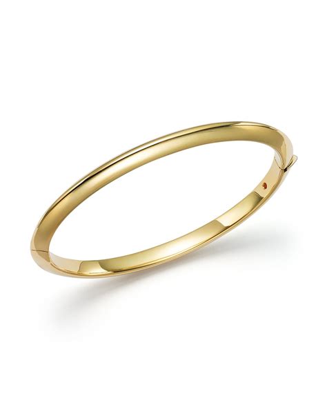 18k yellow gold bangle.